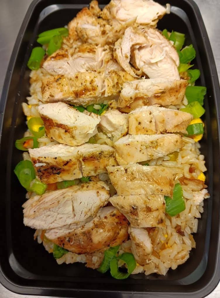A fresh whole-food bowl prepared by Just Good Whole Food
