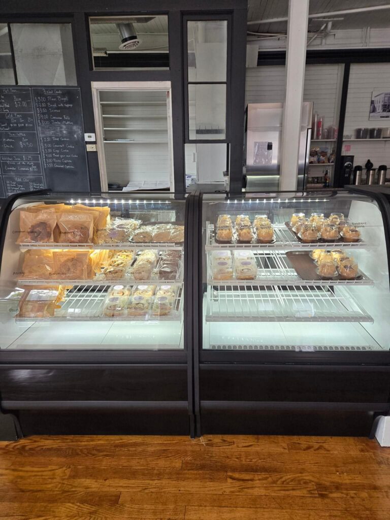 The bakery display case inside The Jeromesville Daily Grind
